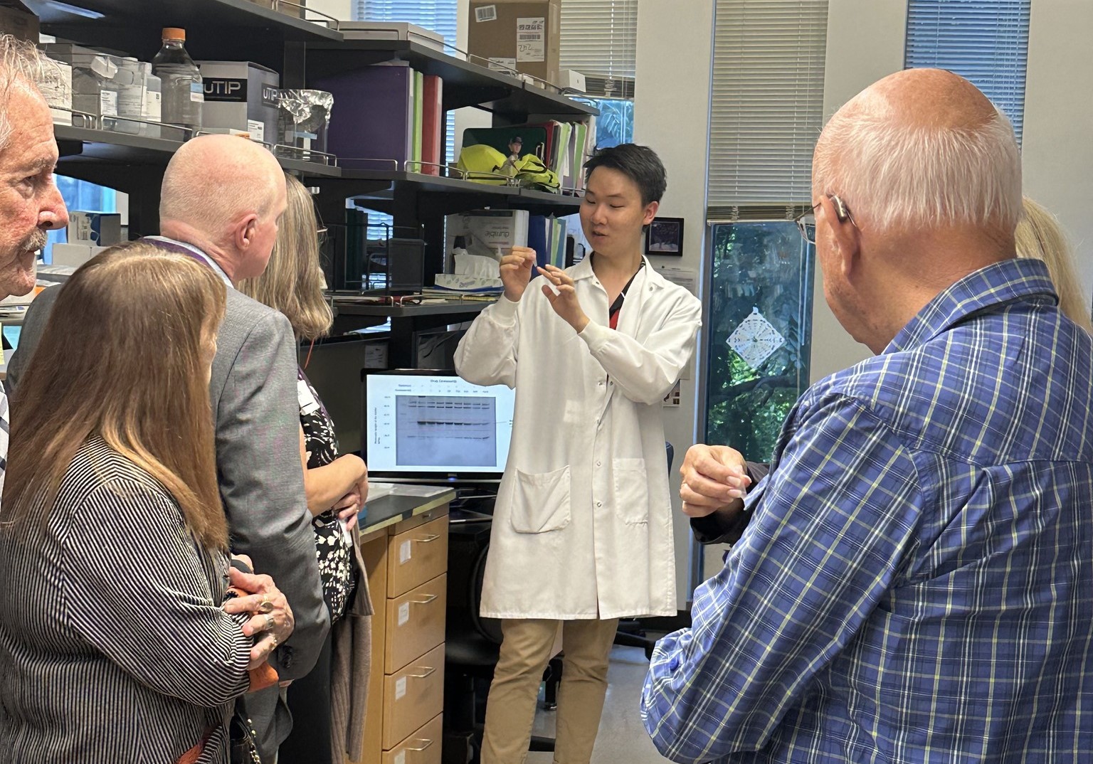 Researcher leading lab tour