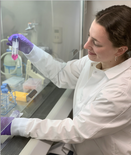 A scientist preparing tumor samples