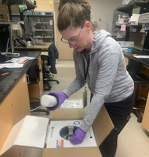 A scientist shipping samples