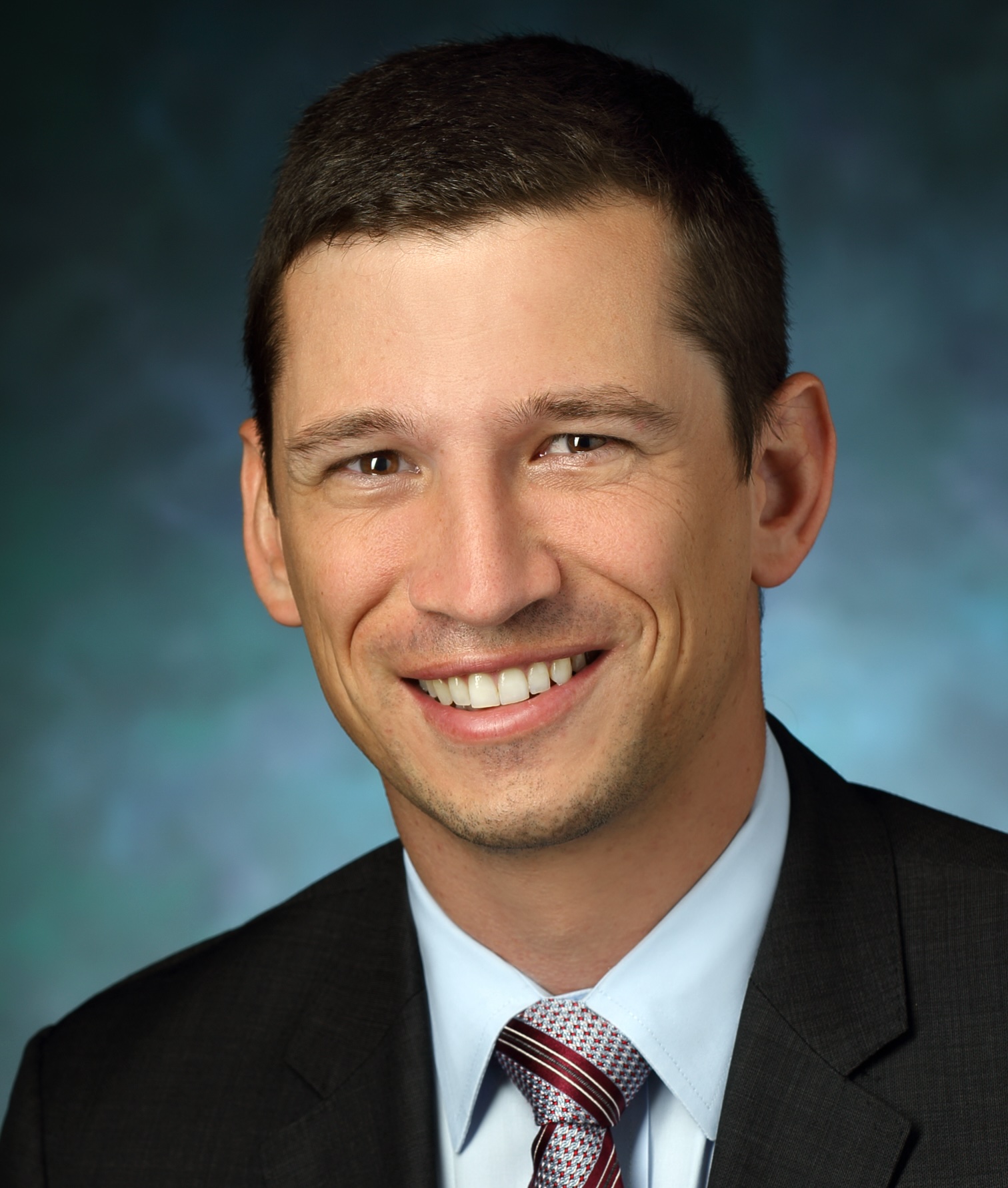 headshot of joel sunshine